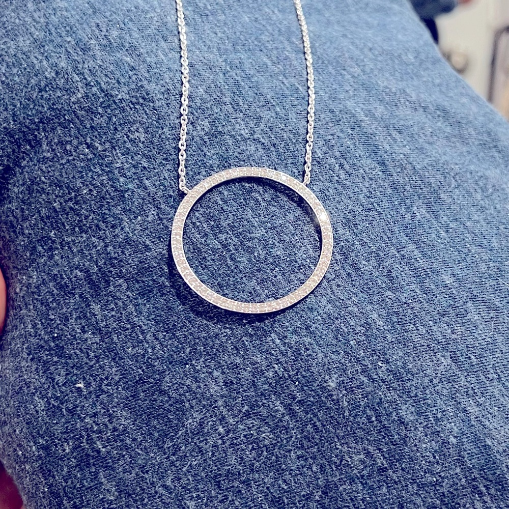 This is a beautiful eternity diamond necklace 16” inch long with 1 ct